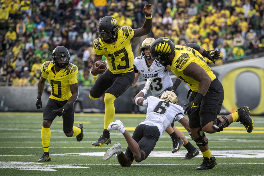 Brown throws for 3 TDs as No. 7 Oregon downs Colorado 52-29 - The Columbian